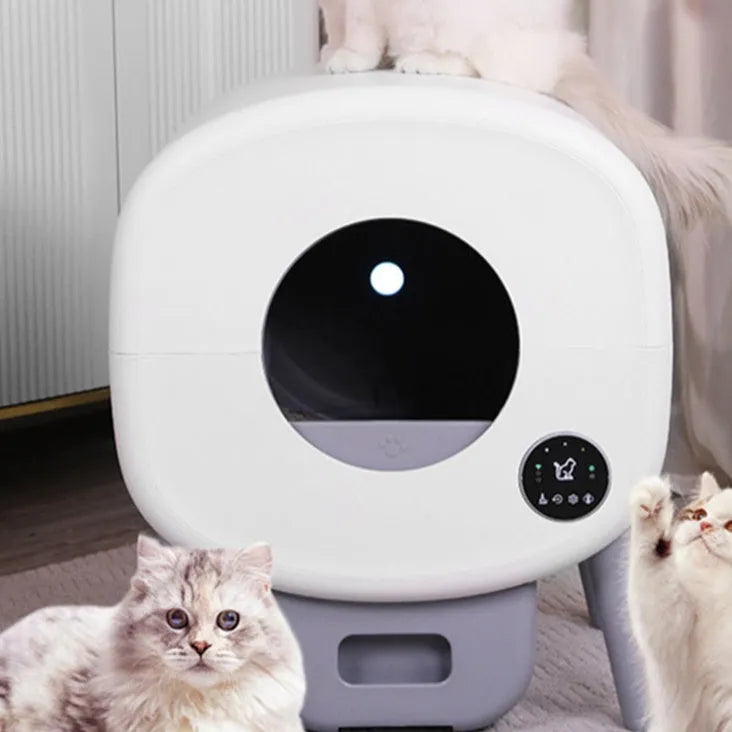 White intelligent automatic self-cleaning cat litter box with control panel on ABS plastic housing.