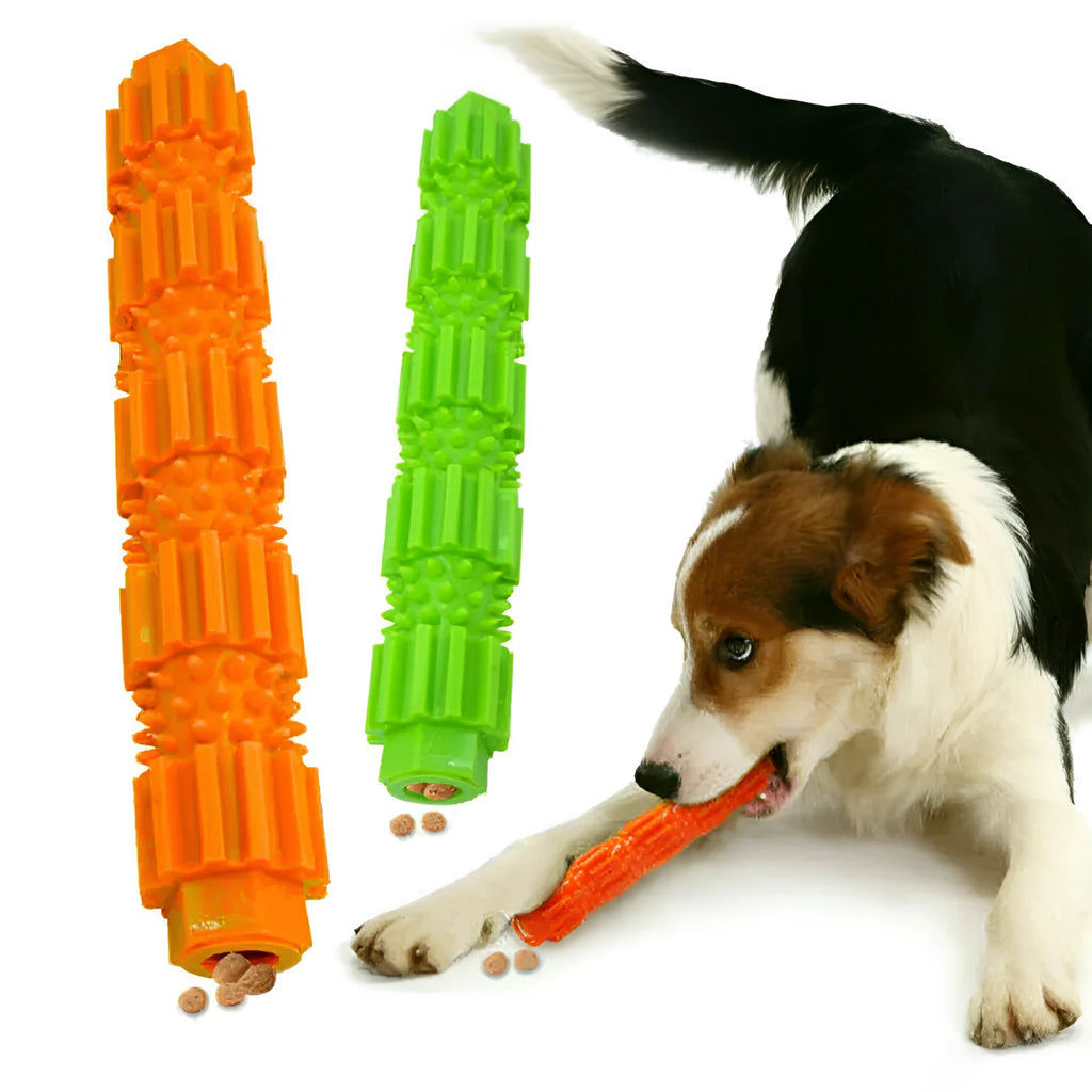 Green and orange rubber dog chew toy with treat dispensing hole and textured surface
