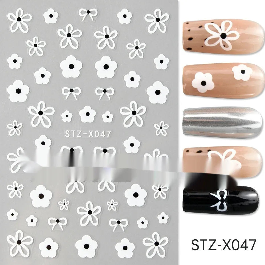 Cartoon nail art stickers sheet with black and silver love heart designs