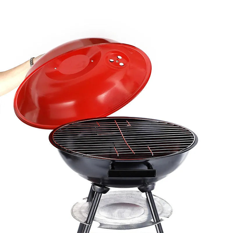 Portable 14-inch iron barbecue grill with Apple stove minimalist design on a patio.