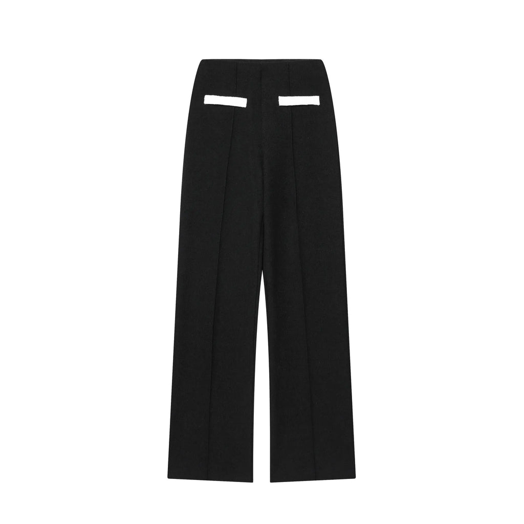 Women's beaded leather top and high-waisted stretch trouser suit in street fashion style