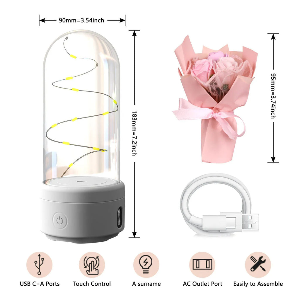 LED bouquet night light with Bluetooth speaker inside a glass cover on a black base.