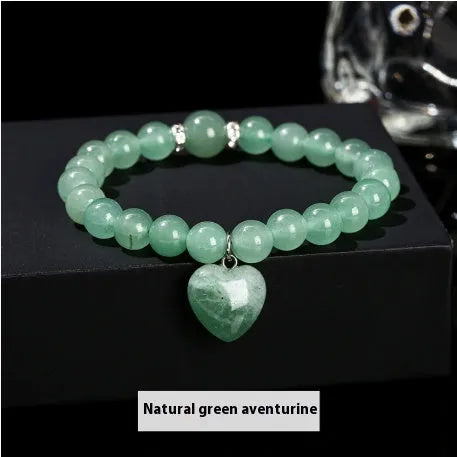 Handmade natural gemstone bracelet with tiger's eye, aventurine, and crystal beads in geometric round design