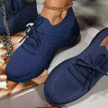 Women's thick-soled solid colour dad sneaker in multiple colour options on a white background.