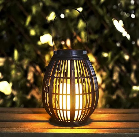 Retro style solar garden light with oval rattan shade in picture colour finish