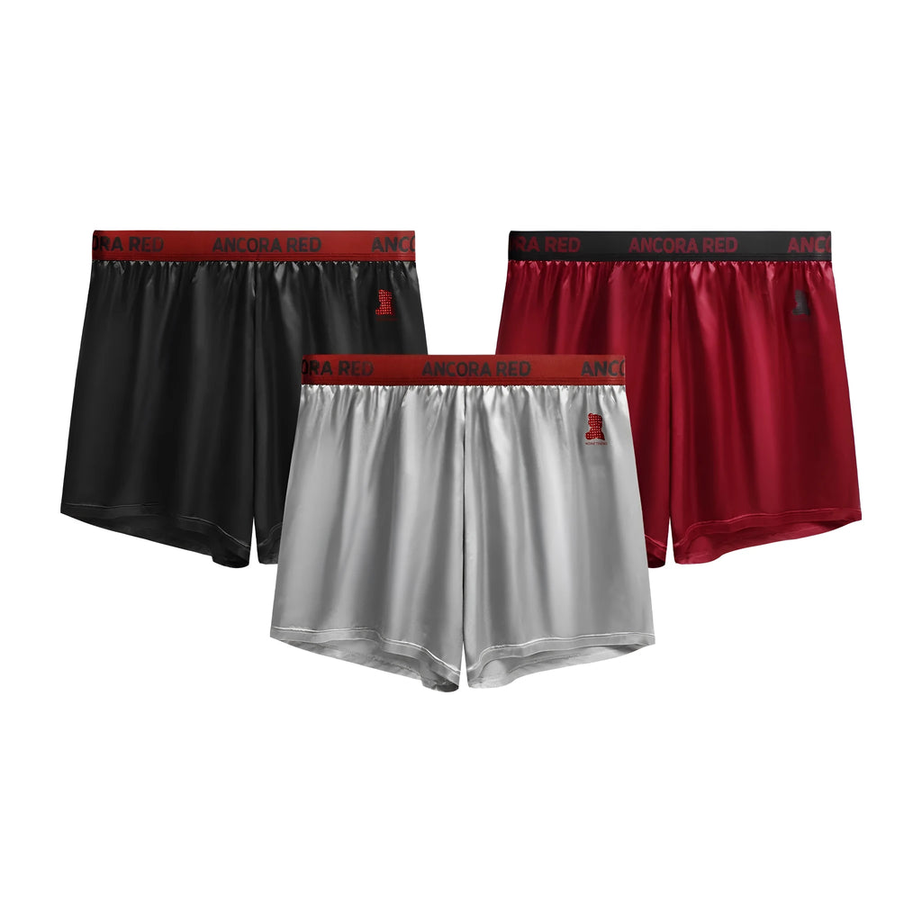 Men's solid colour polyester boxer briefs on a mid waist, shown in multiple colour options.