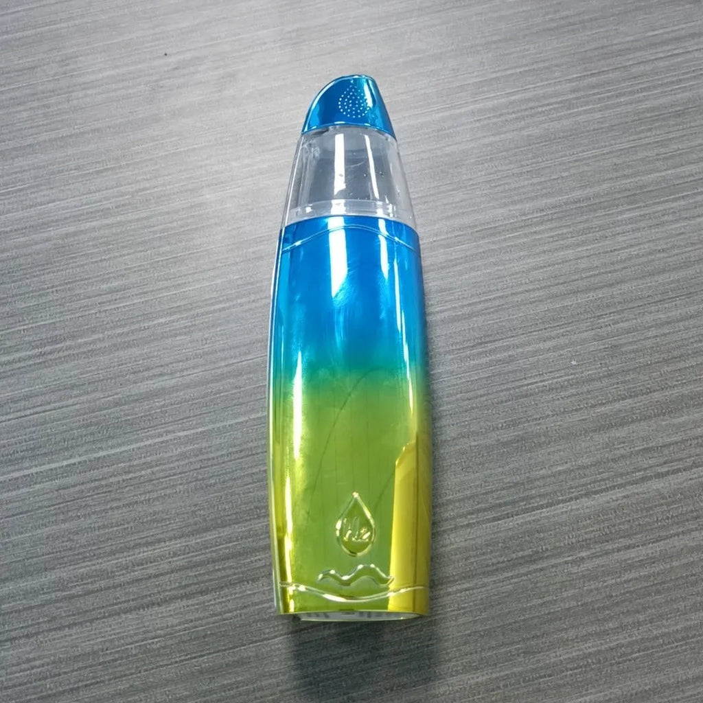 Peacock blue handheld USB rechargeable facial steamer for skin hydration.