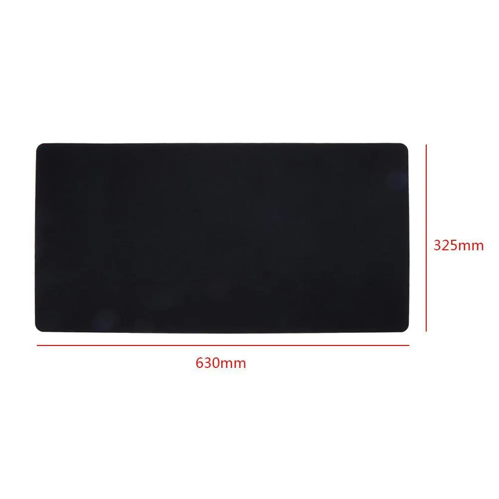 Large black felt desk mat with sewn edges, measuring 325x635mm, on an office desk with a keyboard and mouse.
