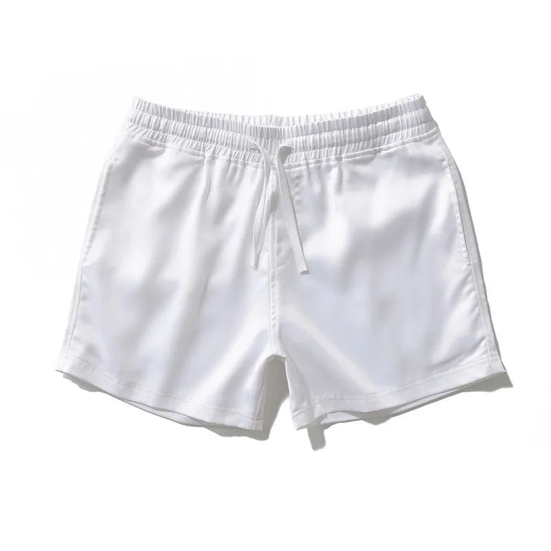 Men's plus size beach shorts in black, loose straight leg cut, mid waist, polyester blend.