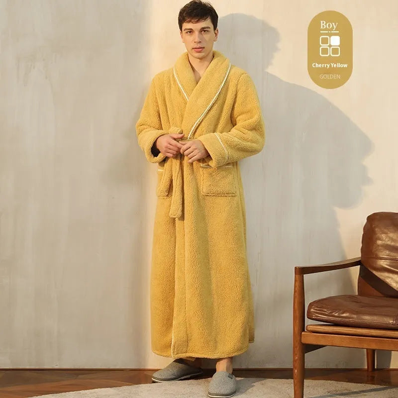 Man and woman wearing matching thick flannel bathrobes in winter colours like navy blue and cherry yellow.