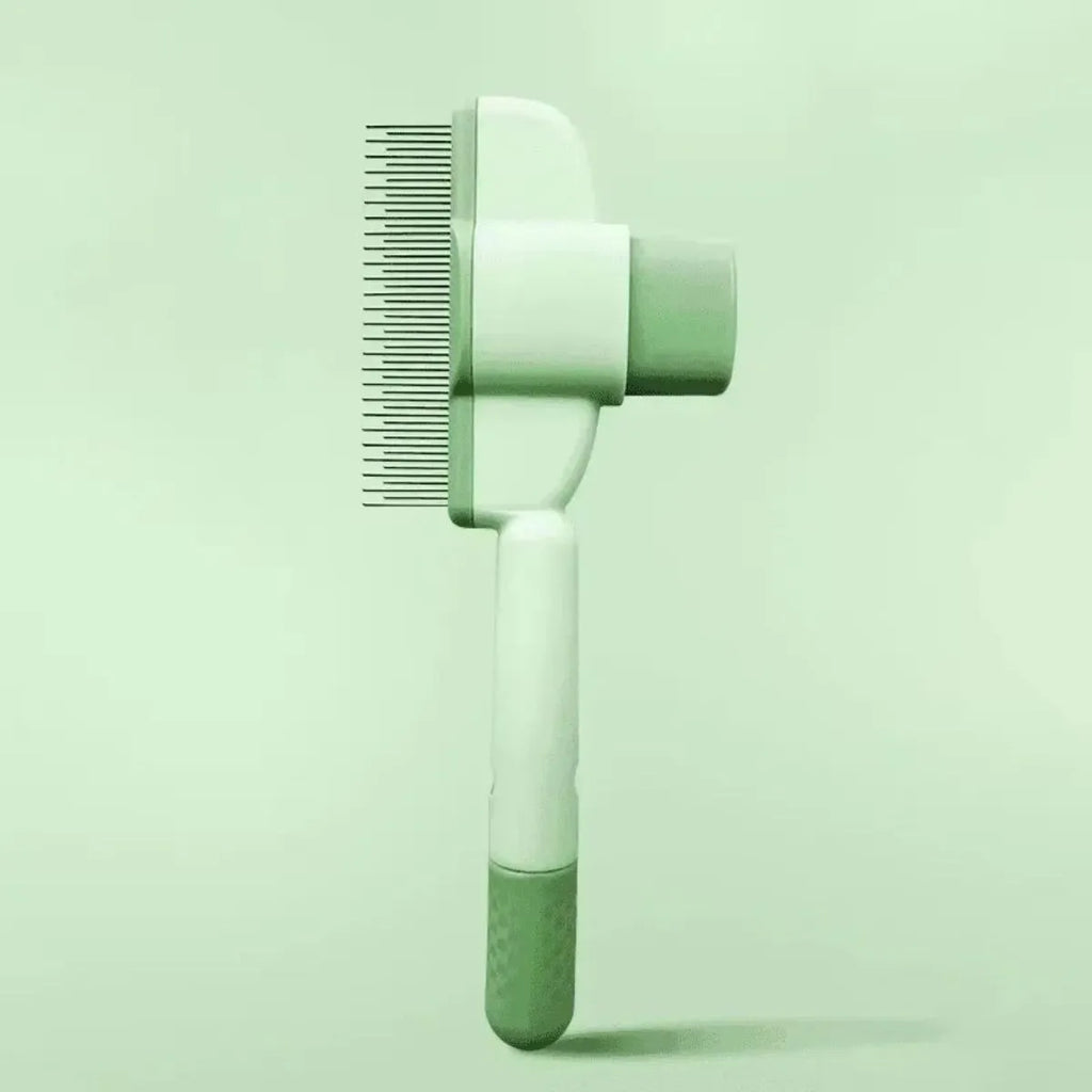 Green and yellow dog grooming brush with one-click hair removal mechanism and pressure adjustment