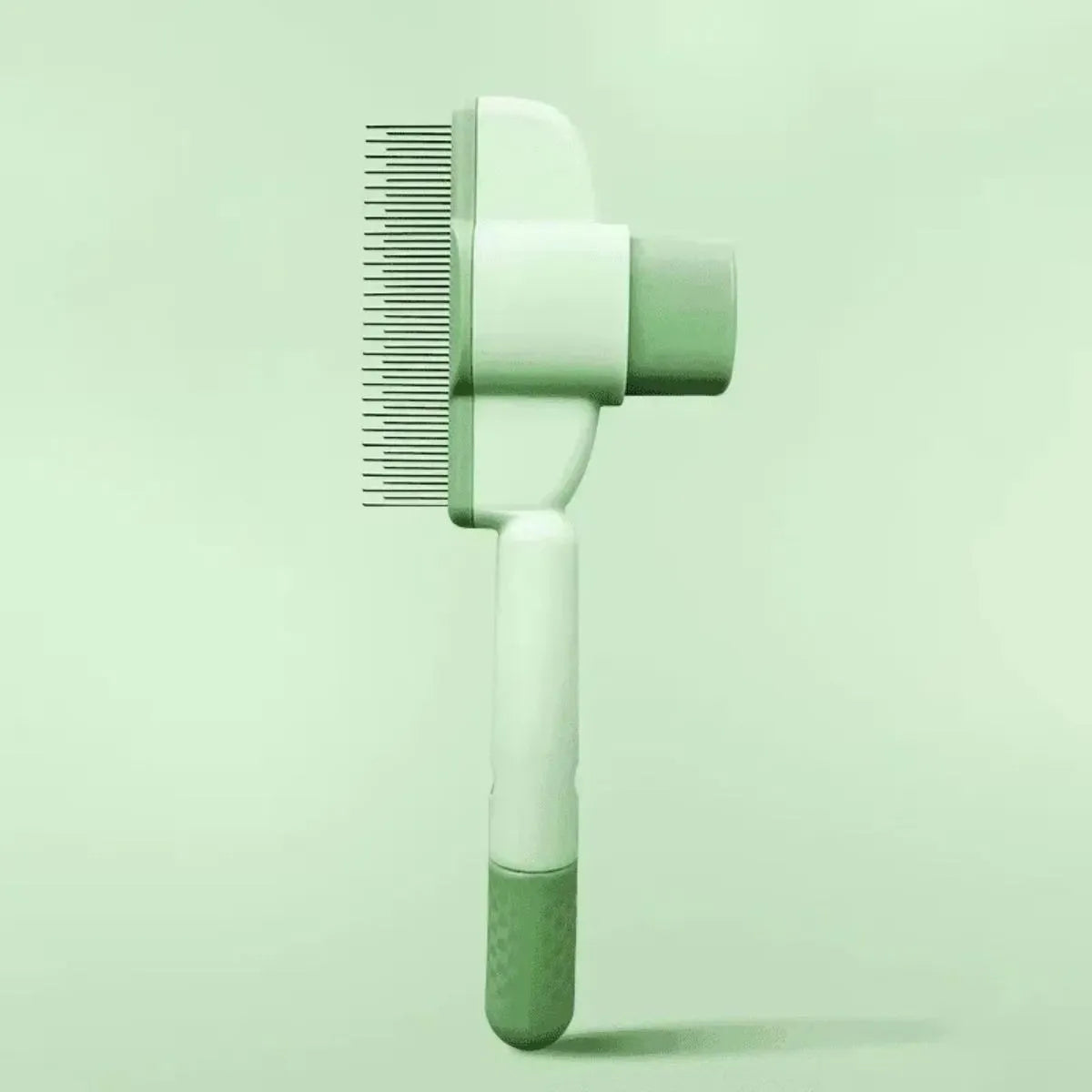 Green and yellow dog grooming brush with one-click hair removal mechanism and pressure adjustment