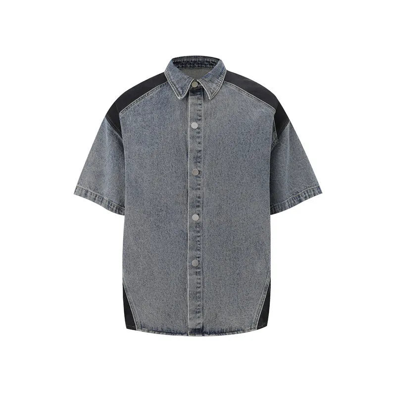 Retro washed denim suit comprising a short-sleeved jacket and trousers in blue.