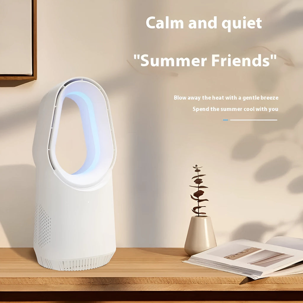 White bladeless tower fan with touch controls and remote on wooden desk