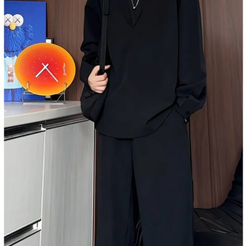 Men's black casual two-piece suit with long sleeve polo shirt and slim fit trousers