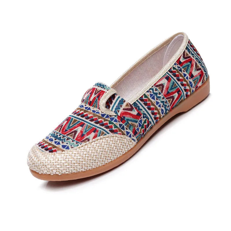 Women's flat heel cloth shoes in ethnic style with colour stitching and a shallow mouth design.