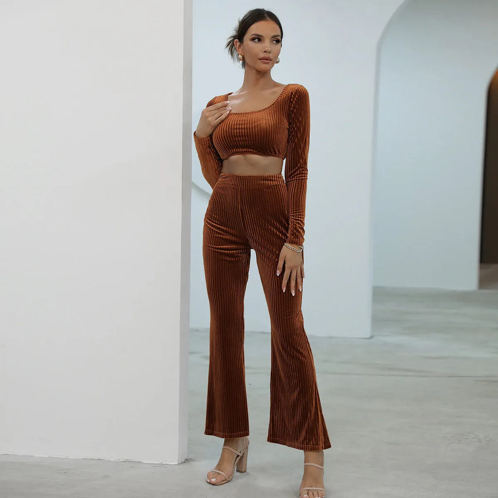 Caramel-coloured women's long sleeve sweater and trousers casual set on a hanger.