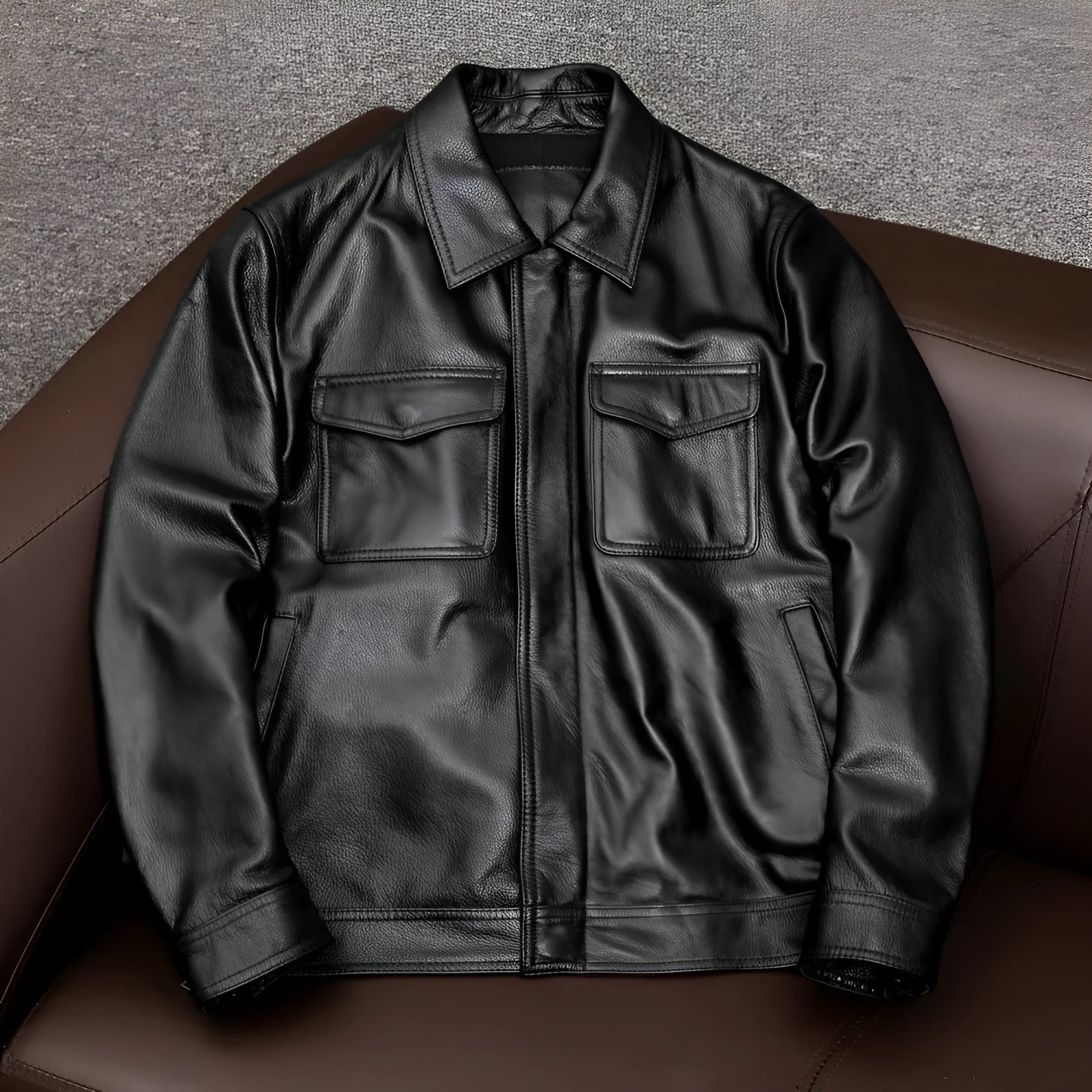 Men's black lapel collar PU leather jacket with patterned detailing and side pockets