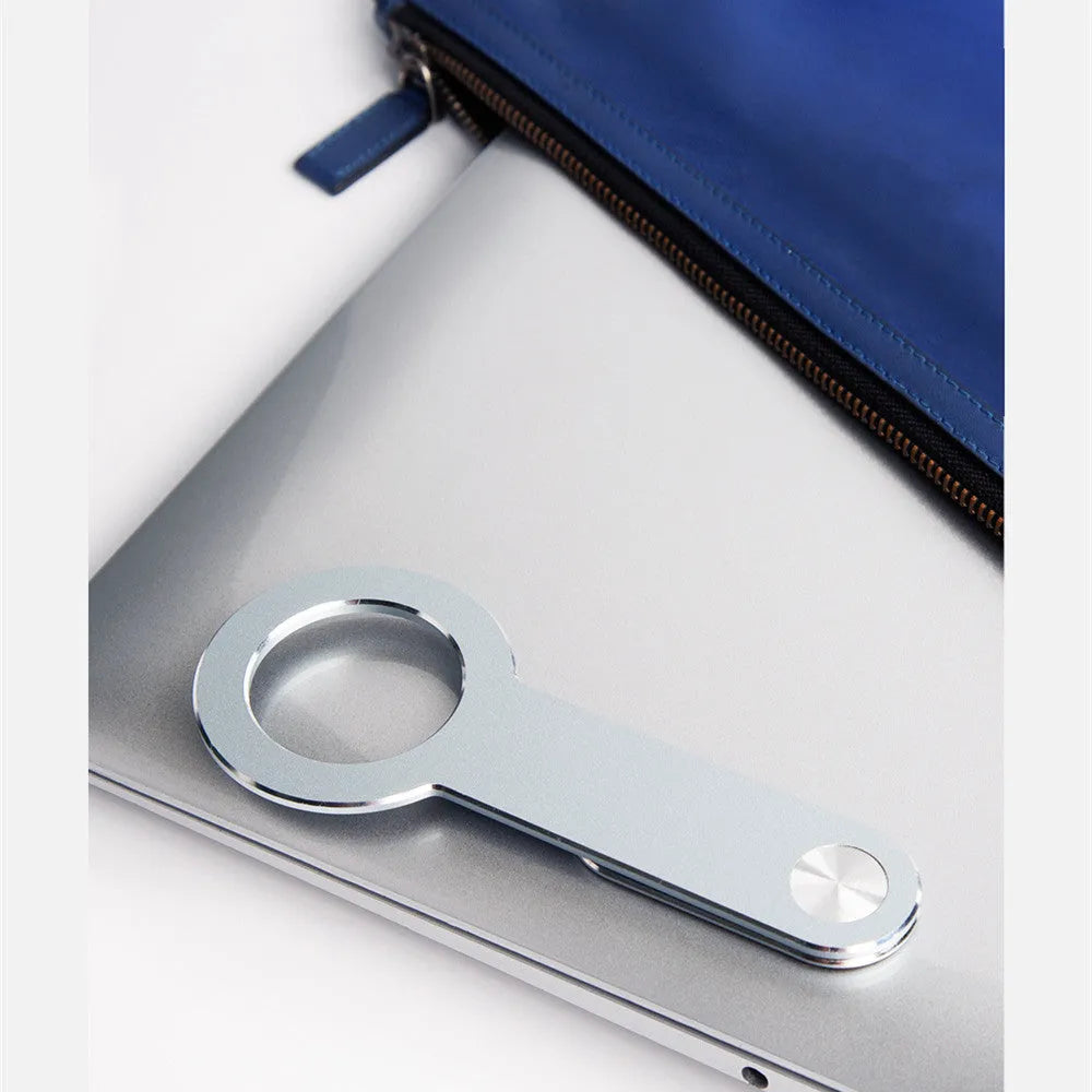 Metallic silver aluminium alloy desktop mobile phone holder with magnetic mount.