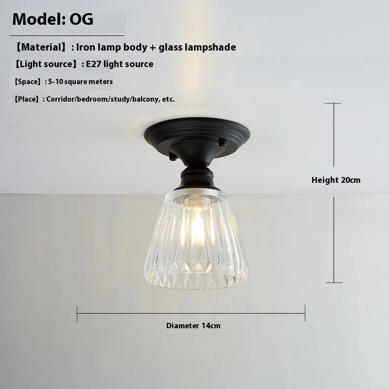 American retro single-head ceiling lamp with clear glass shade showing exposed filament style
