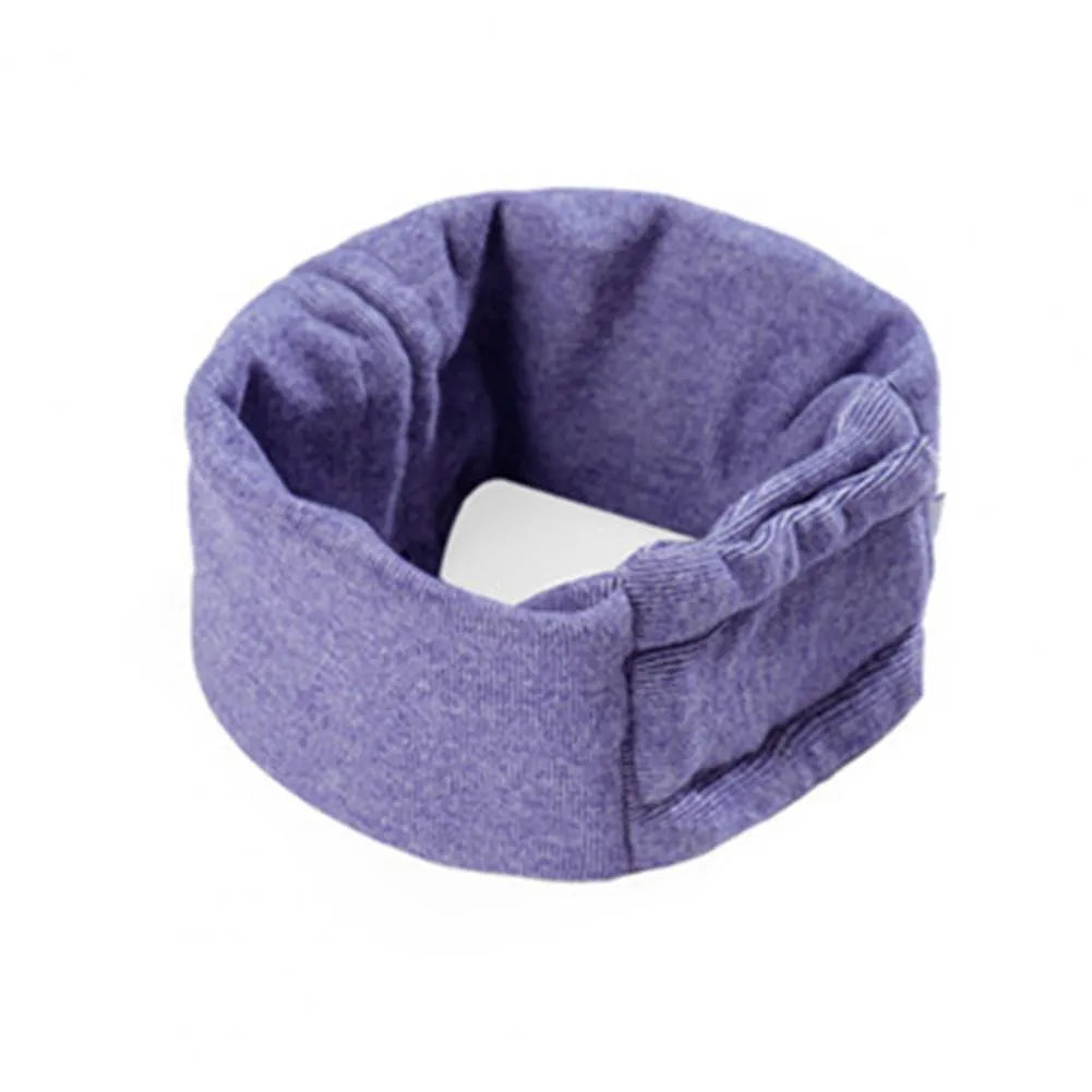 Dog wearing purple noise reduction hoodie with ear wraps and head cover