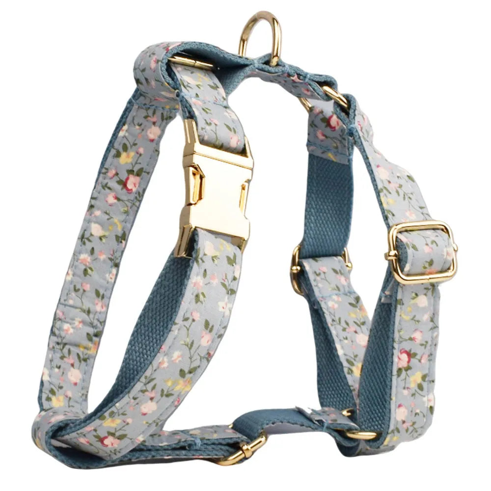 Blue floral pattern dog collar set with matching leash, vest, bow and accessories for small dogs