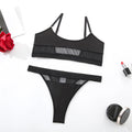 Black and white full cup bra and pants set for women on a hanger.