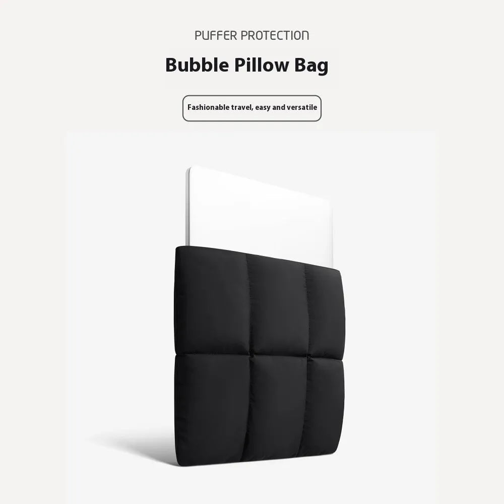 Soft fluffy polyester laptop sleeve in black with visible sewing thread detail, shown next to a laptop.