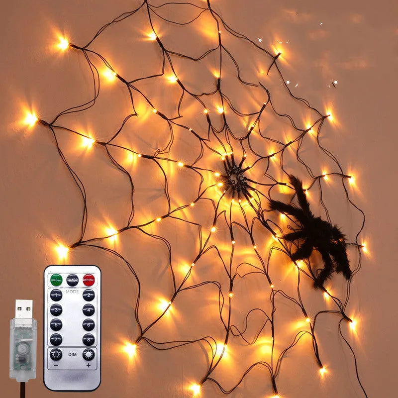 Halloween LED spider web string light with 70 warm white lights and furry spider on black wire, 1 metre diameter