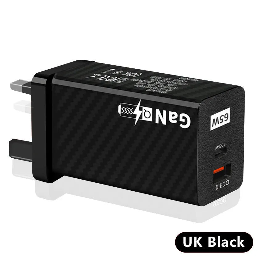 Compact white 65W Gallium Nitride laptop charger with USB-C port next to EU and US plug options.
