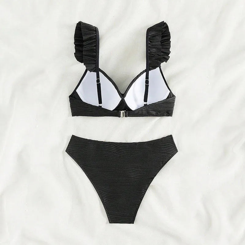 Women's solid colour bikini swimsuit in black or khaki on a mannequin.