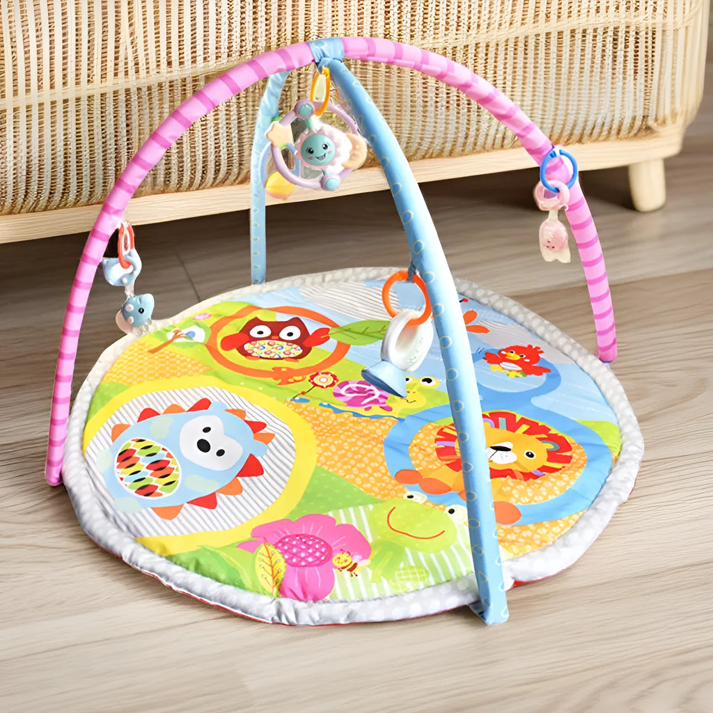 Soft velvet baby play mat with colourful animal designs, laid flat as a crawling carpet.