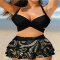 Women's purple split bikini set with high-waisted briefs and matching skirt for swimming