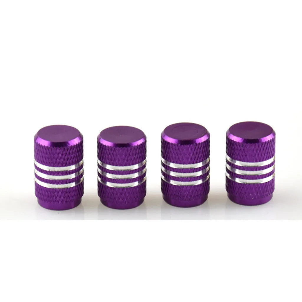 Set of aluminium alloy colour car tyre valve caps in various colours including red, blue, silver, and gold