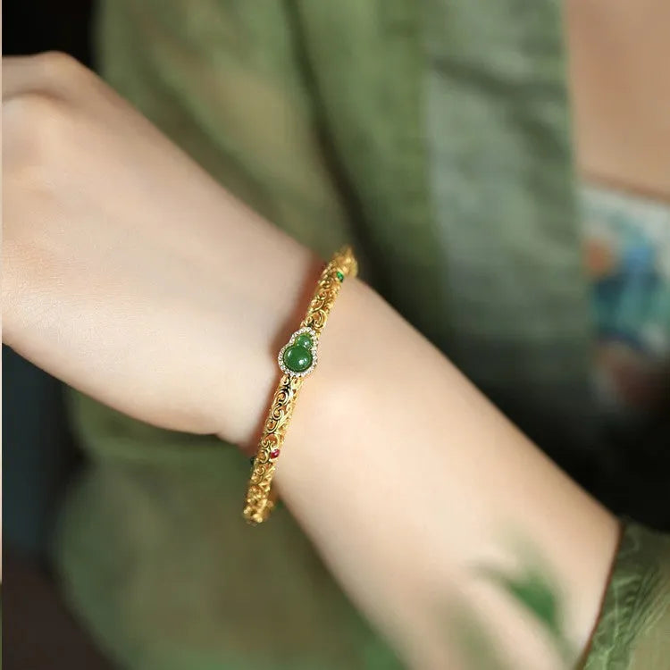 Gold-plated women's bracelet with xiangyun gourd design and retro opening style