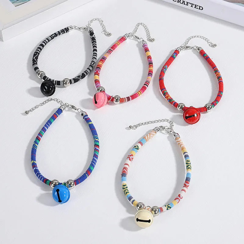 Coloured ethnic floral pattern pet collar with a bell and plastic buckle for dogs and cats.