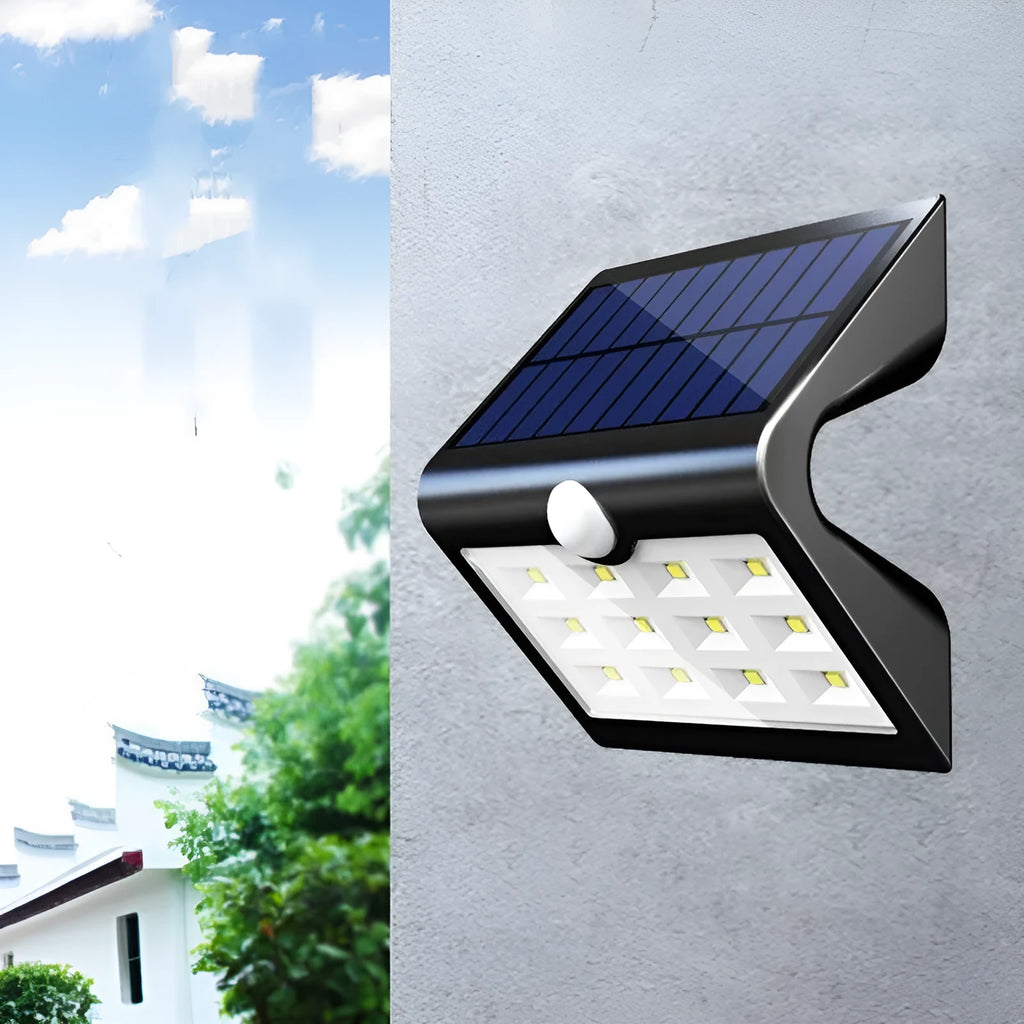 Black solar-powered outdoor wall light with motion sensor for garden and pathway lighting
