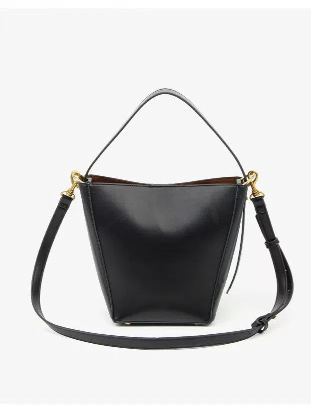 Urban minimalist bucket crossbody bag in army green with front three-dimensional pocket and adjustable strap