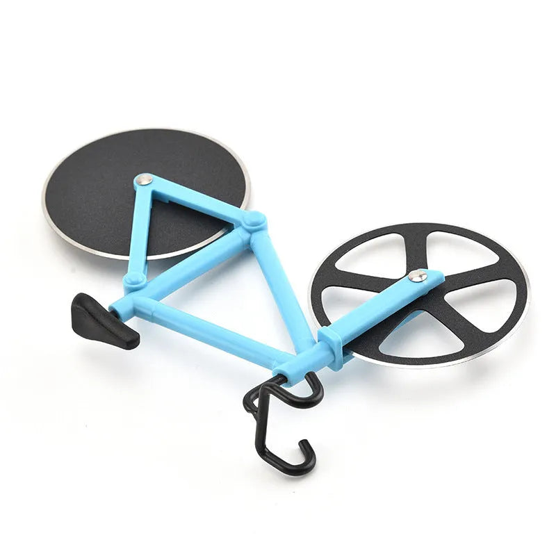 Bicycle-shaped pizza cutter with stainless steel blade and hand-grip handle on a cutting board