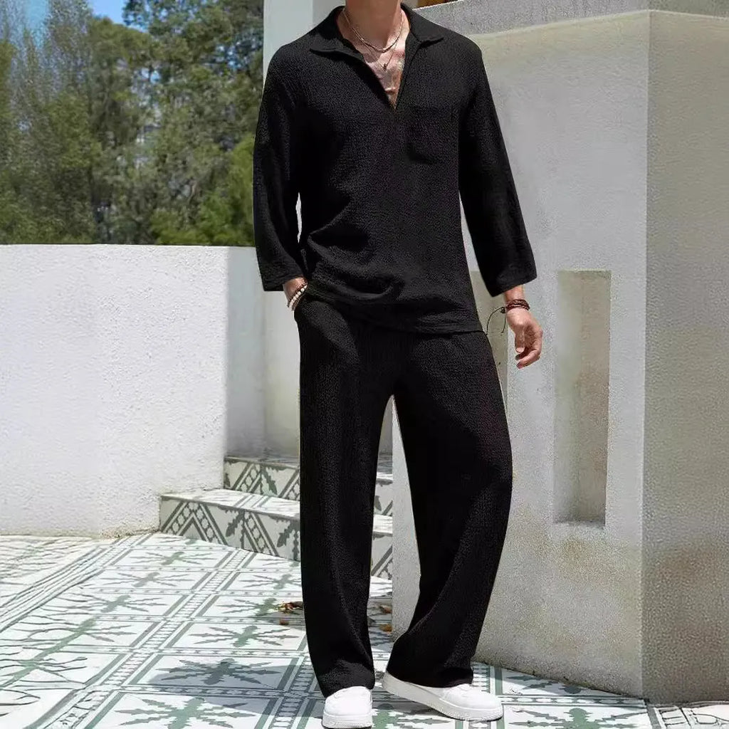 Men's casual polyester commuter suit in lake blue, showing shirt jacket and trousers laid flat.