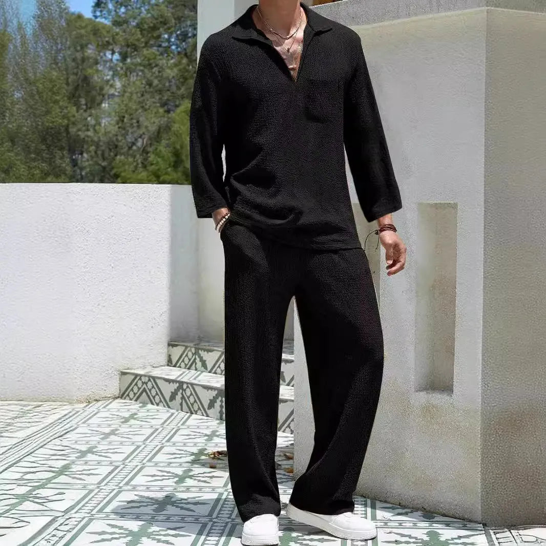 Men's casual polyester commuter suit in lake blue, showing shirt jacket and trousers laid flat.