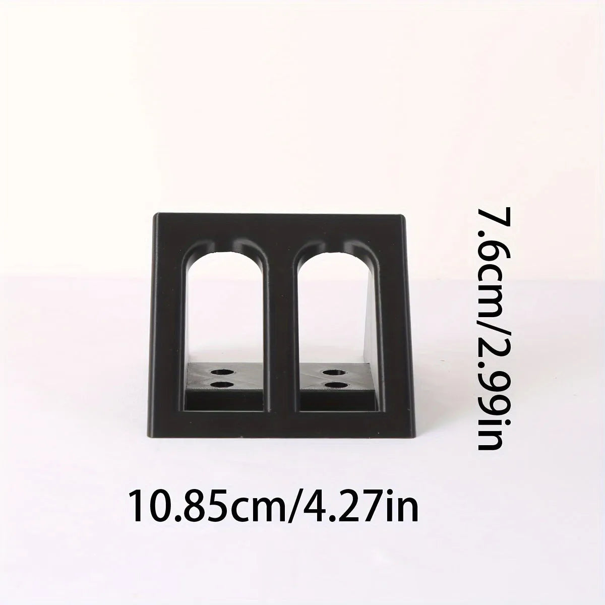 Black plastic pistol display stand for replica and collectable firearms.