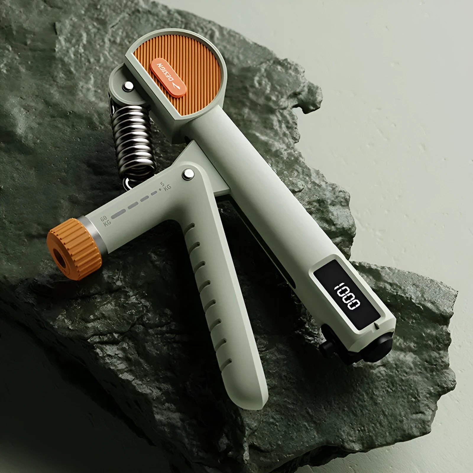 Adjustable count spring hand grip strengthener in ABS plastic construction showing multiple colour options