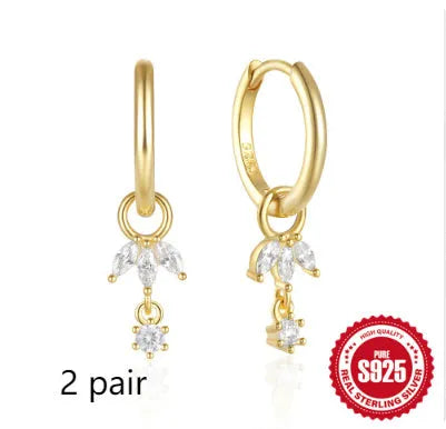 A pair of S925 sterling silver geometric sunflower earrings with inlaid golden-three diamonds zircon stones.