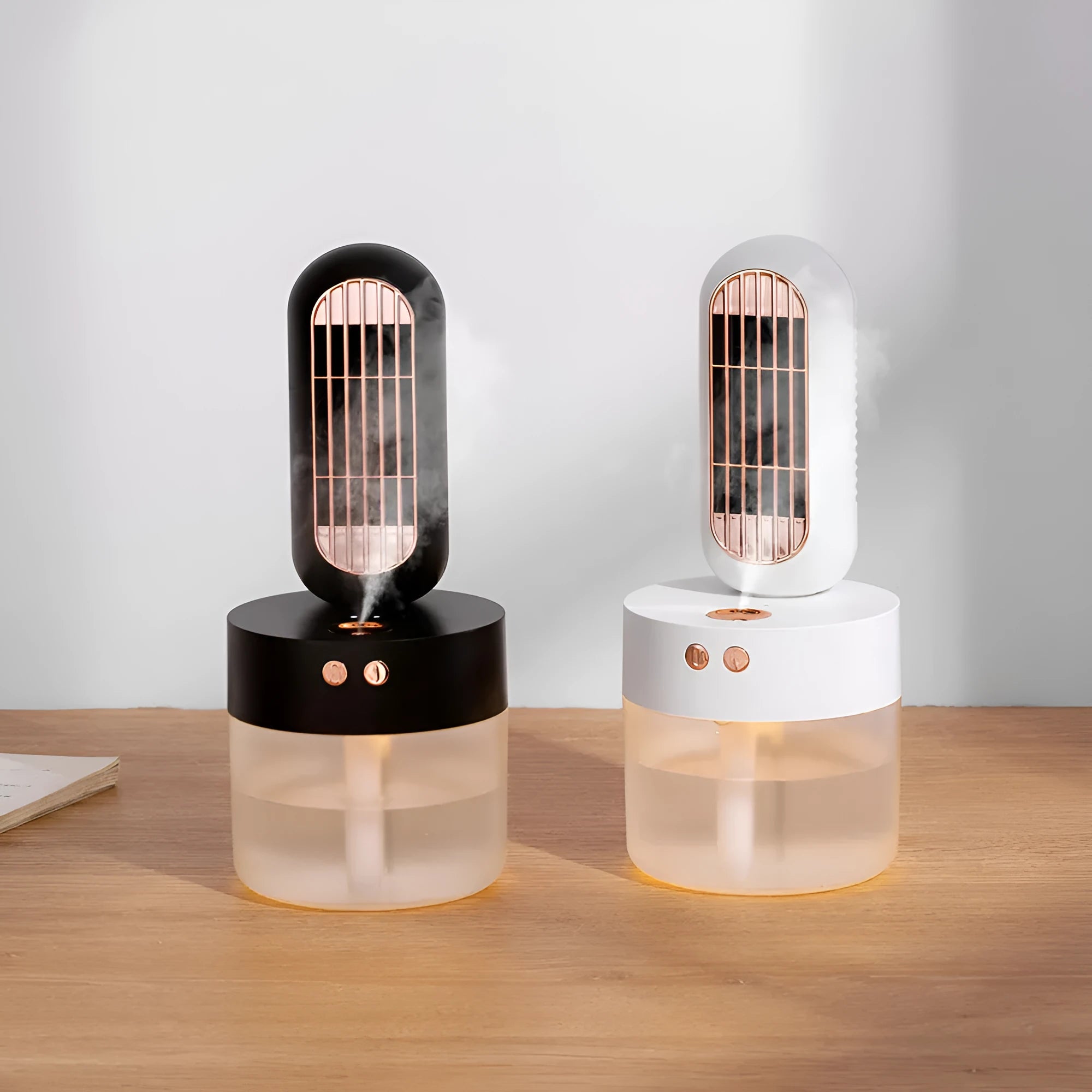 Small black and white portable humidifier fan with side-to-side head shaking feature and charging cable