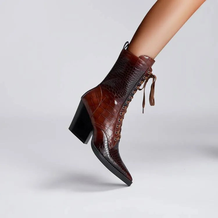 Dark brown women's pointed toe ankle boots with a chunky heel and side zip.