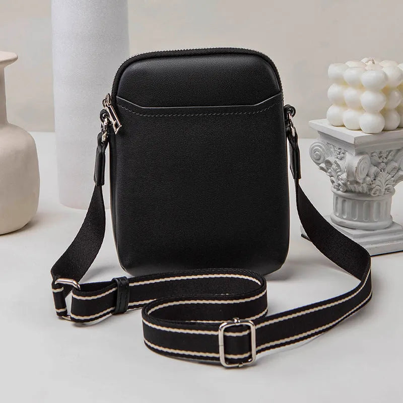 Small solid colour PU leather crossbody shoulder bag for mobile phone in beige.