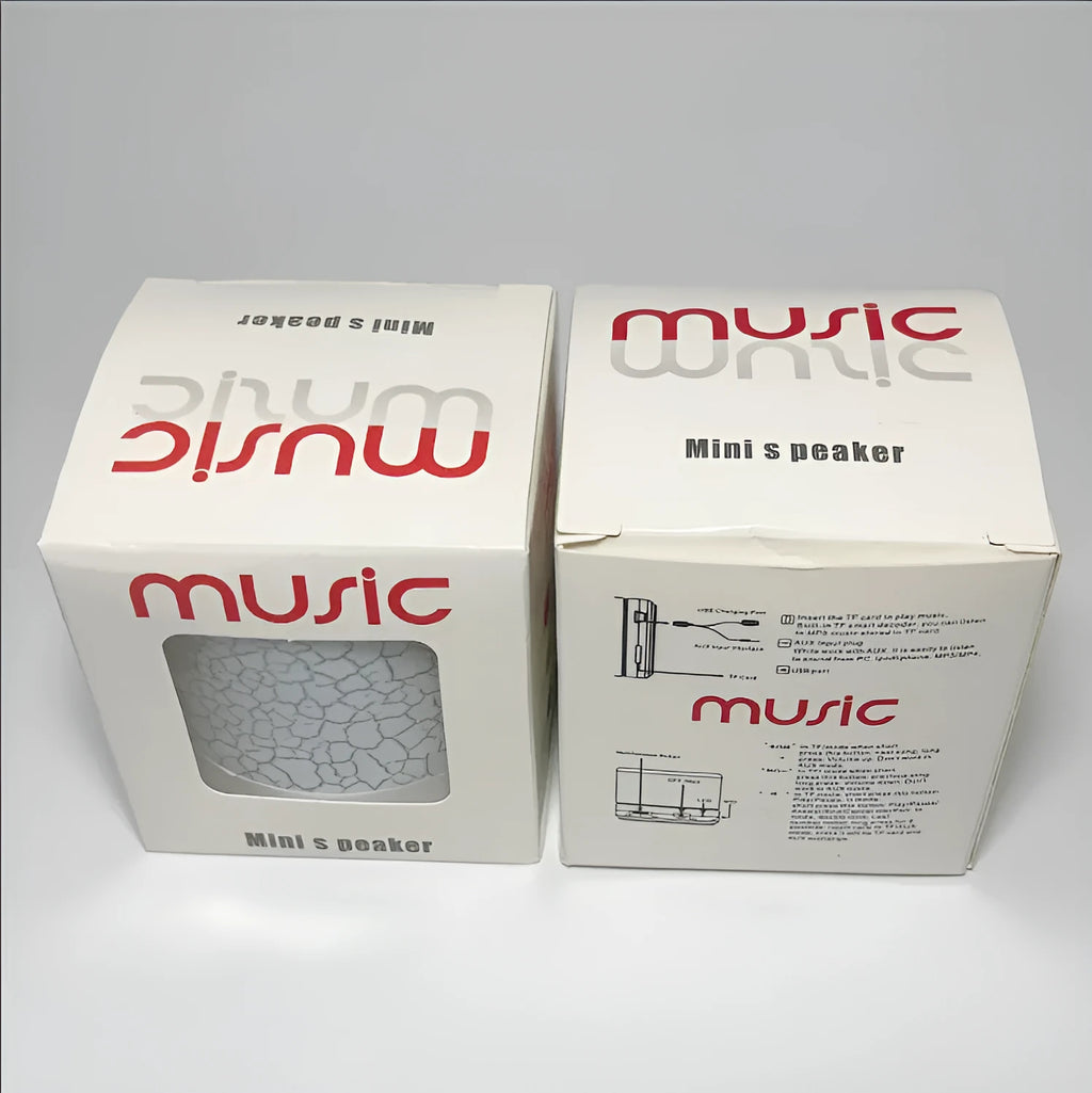 A9 Mini Cracked Bluetooth speaker in white with cracked-effect finish and LED lights