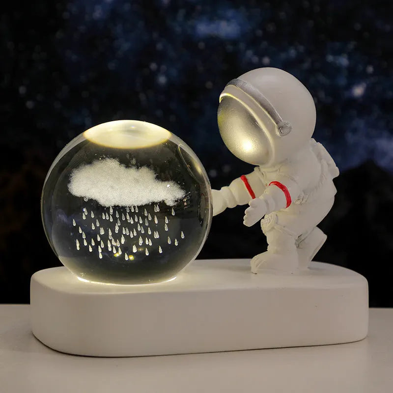 6cm crystal ball night light with USB cable showing detailed planetary and astronaut 3D designs