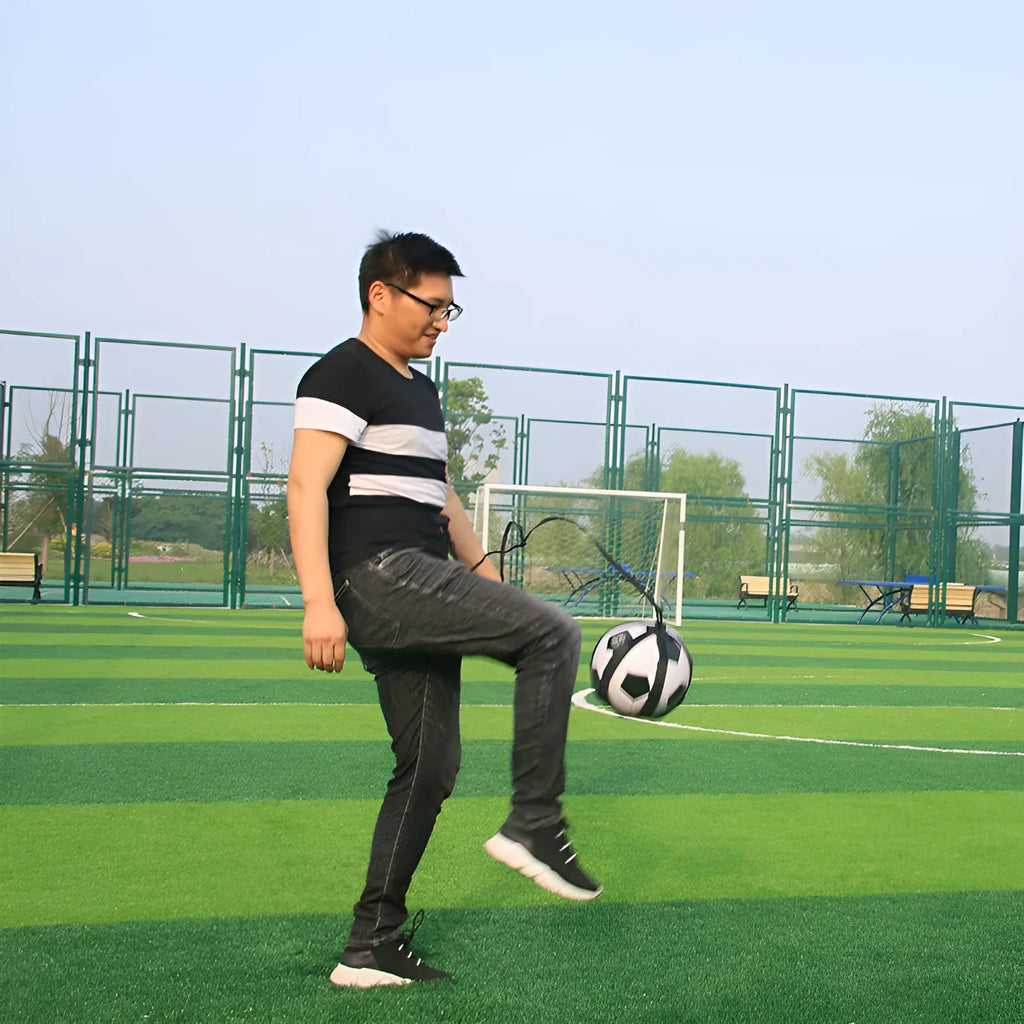 Black football juggling belt with rotating mechanism and 2 metre length for solo training